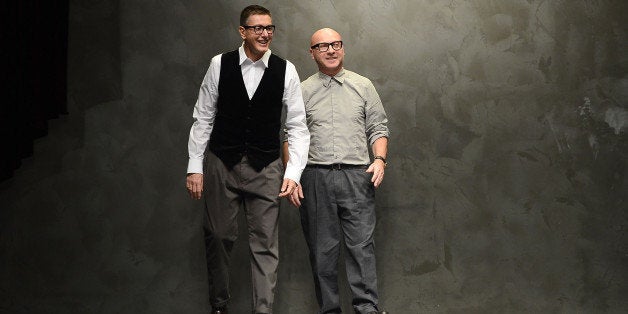 MILAN, ITALY - FEBRUARY 24: Stefano Gabbana and Domenico Dolce acknowledge the applause of the audience after the runway at the Dolce & Gabbana fashion show as part of Milan Fashion Week Womenswear Fall/Winter 2013/14 on February 24, 2014 in Milan, Italy. (Photo by Venturelli/WireImage)