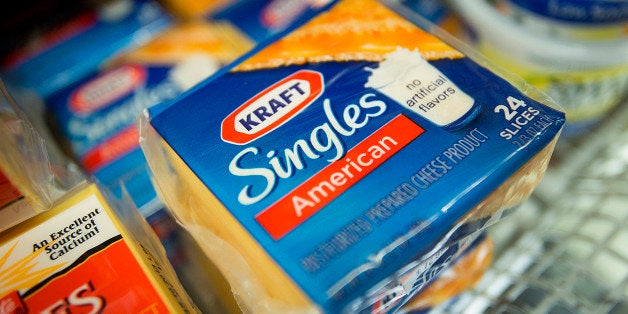 Packages of Kraft Foods Group Inc. Singles cheese slices are displayed for sale at a supermarket in New York, U.S., on Monday, Nov. 5, 2012. Kraft Foods Group Inc. is scheduled to release earnings data on Nov. 7. Photographer: Scott Eells/Bloomberg via Getty Images