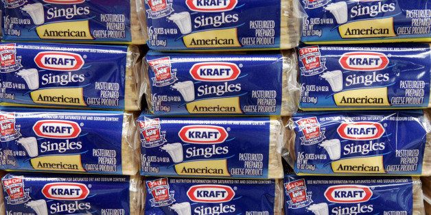 **FILE** Packages of Kraft Singles are seen in this July 24, 2006 file photo, in Chicago. Kraft Foods Inc., the nation's largest food and beverage maker, reported a second-quarter profit rise of nearly 4 percent on Monday, July 28, 2008, saying higher prices helped offset rising commodity costs. (AP Photo/Charles Rex Arbogast, file)