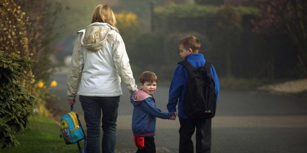 KNUTSFORD, UNITED KINGDOM - MARCH 23: A mother walks her children to school in the constituency of Britain's Chancellor George Osbourne on March 23, 2011 in Knutsford, United Kingdom. The Chancellor will implement further measures to tackle the United Kingdom's deficit when he presents the budget to Parliament. The UK Consumer Prices Index (CPI) annual rate of inflation has risen to 4.4%, the highest since October 2008, increasing pressure on the Bank of England to raise interest rates and slow inflation. (Photo by Christopher Furlong/Getty Images)