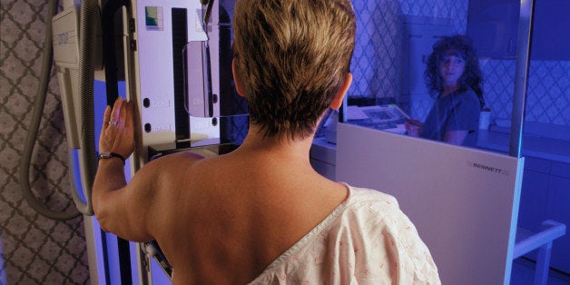Woman getting mammogram