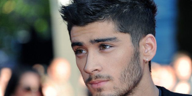Zayn Malik attends the UK Premiere of 'One Direction: This Is Us 3D' - VIP Arrivals, on Tuesday August 20, 2013, in London. (Photo by Jon Furniss Photography/Invision/AP Images)