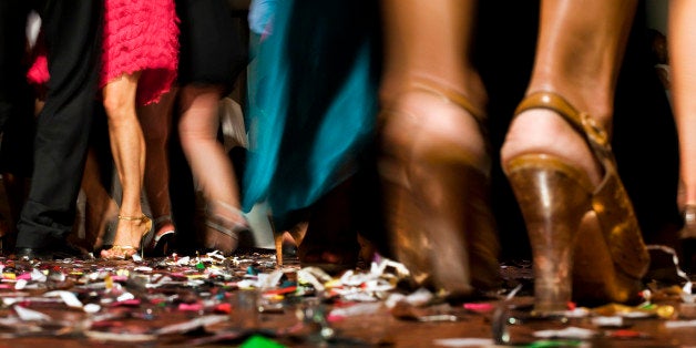 Wedding party, feet and legs of dancing people.