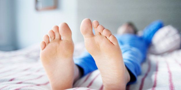 feet on bed