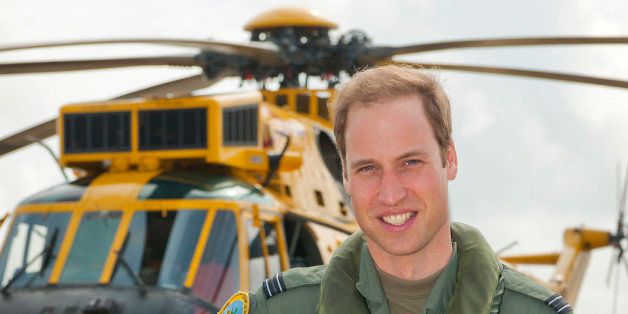FILE - In this Friday June 1, 2012 file image released by Britain's Ministry of Defence Britain's Prince William poses in front of a Sea King helicopter at RAF Valley in Anglesey Wales. Prince William has finished his tour of duty as a Royal Air Force search-and-rescue helicopter pilot and has left operational service with the British military to focus on royal duties and charity work, royal officials said Thursday, Sept 12, 2013. Williamￃﾢￂﾀￂﾙs Kensington Palace office said that the second in line to the British throne completed his final shift earlier this week. (AP Photo/ SAC Faye Storer, MOD, File)