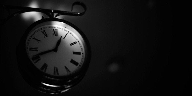 Close-Up Of Alarm Clock On Night Table