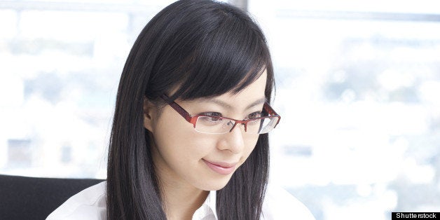 young business woman in glasses ...