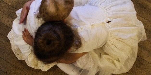 Comforting her younger sister