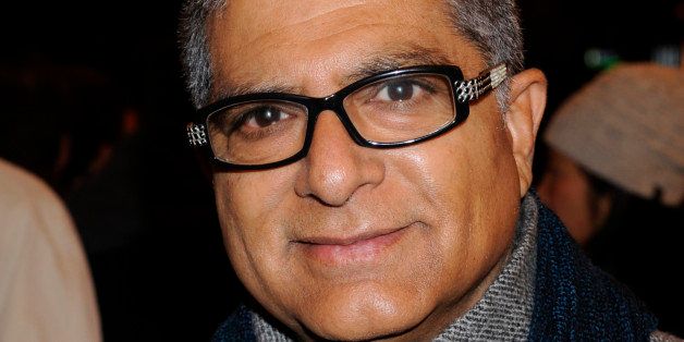 Deepak Chopra arrives for the first ever concert by Paul McCartney at Harlem's Apollo Theater, Monday, Dec. 13, 2010 in New York. (AP Photo/Henny Ray Abrams)