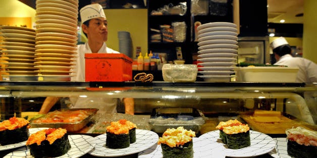 This picture taken on June 22, 2008 shows sushi displayed in a sushi bar of Tokyo. Victims of their success with fish lovers, especially with the growing demand for sushi, about 70 percent of the Mediterranean catch goes to Japan and prices keep rising. AFP PHOTO/PHILIPPE LOPEZ (Photo credit should read PHILIPPE LOPEZ/AFP/Getty Images)