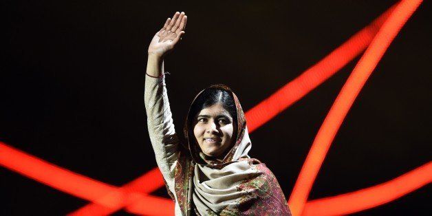 Nobel Peace Prize laureate Malala Yousafzai greets the audience at the Nobel Peace Prize Concert at the Oslo spectrum on December 11, 2014. The 17-year-old Pakistani girls' education activist Malala Yousafzai known as Malala shares the 2014 peace prize with the Indian campaigner Kailash Satyarthi, 60, who has fought for 35 years to free thousands of children from virtual slave labour. AFP PHOTO / ODD ANDERSEN (Photo credit should read ODD ANDERSEN/AFP/Getty Images)