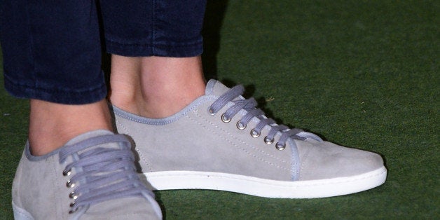 DUNEDIN, NEW ZEALAND - APRIL 13: Catherine, Duchess of Cambridge (shoes detail) watches a Rippa Rugby tournament in the Forstyth Barr Stadium on day 7 of a Royal Tour to New Zealand on April 13, 2014 in Dunedin, New Zealand. The Duke and Duchess of Cambridge are on a three-week tour of Australia and New Zealand, the first official trip overseas with their son, Prince George of Cambridge. (Photo by Anthony Devlin - Pool/Getty Images)