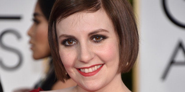 Lena Dunham arrives at the 72nd annual Golden Globe Awards at the Beverly Hilton Hotel on Sunday, Jan. 11, 2015, in Beverly Hills, Calif. (Photo by John Shearer/Invision/AP)