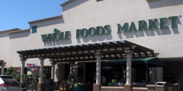 A Whole Foods Market in Albuquerque, N.M. is shown Thursday June 6, 2013 during lunch time. Two employees at this Albuquerque store say they were suspended last month after complaining about being told they couldn't speak Spanish to each other while on the job. A spokesman for the the Austin, Texas-based company says it believes in "having a uniform form of communication" for a safe working environment. (AP Photo/Russell Contreras)