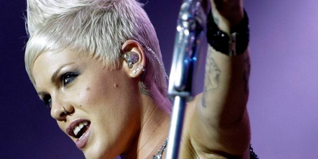 US-singer Pink alias Alecia Beth Moore performs on the main stage, during the Paleo music open air Festival in Nyon, Switzerland, Thursday, July 26, 2007. (KEYSTONE/Martial Trezzini)