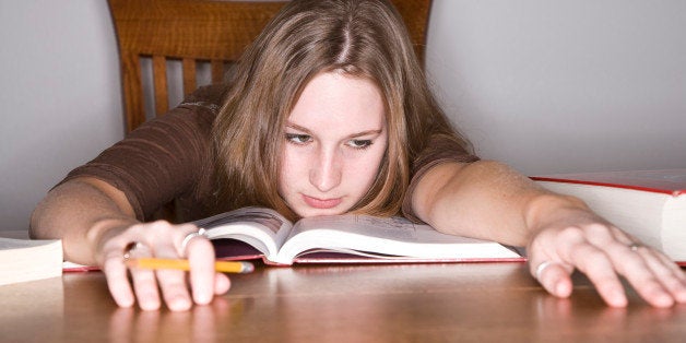 Young woman studying in library