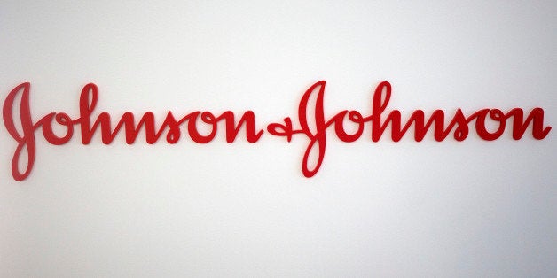 A logo sits on a wall inside Johnson & Johnson's innovation centre in London, U.K., on Thursday, July 18, 2013. Second-quarter sales rose 8.5 percent to $17.9 billion, helped by demand for the company's newer pharmaceutical offerings including the blood thinner Xarelto and the prostate cancer medicine Zytiga. Photographer: Simon Dawson/Bloomberg via Getty Images