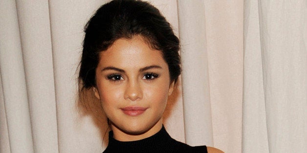 Actress Selena Gomez poses during the 2014 March of Dimes Celebration of Babies at the Beverly Wilshire Hotel on Friday, Dec. 5, 2014, in Beverly Hills, Calif. (Photo by Chris Pizzello/Invision/AP)