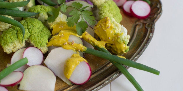 This Jan. 12, 2015 photo shows golden turmeric dip with crudite in Concord, N.H. This is from a recipe by Aarti Sequeira. (AP Photo/Matthew Mead)