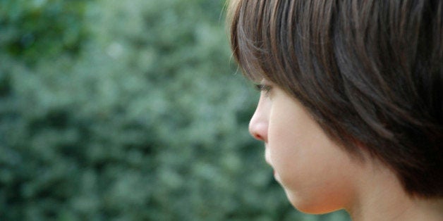 Profile of a dark haired boy