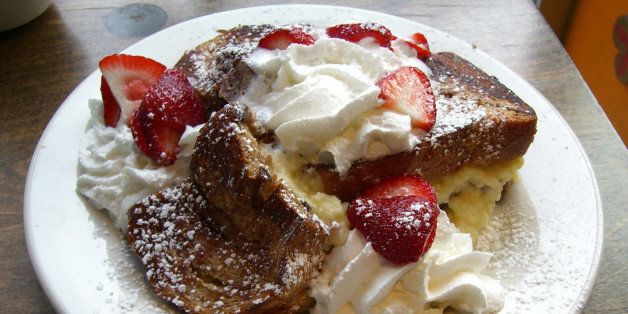 This was really good. French toast stuffed with some kind of sweet ricotta-like cheese, strawberries, whipped cream, and powdered sugar. They gave me a bottle of syrup too, but I think that would have been overkill.