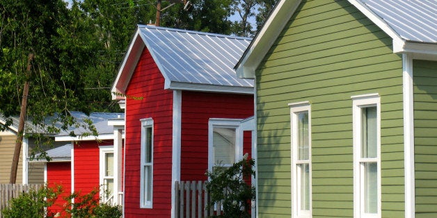 Have been waiting for the light and parked cars to cooperate to get a photo of these little houses near my daughters ( and mine now ) apartment. Today the time was right.