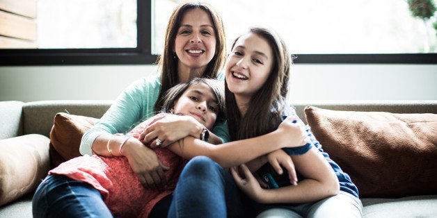 portrait of mother and daughters