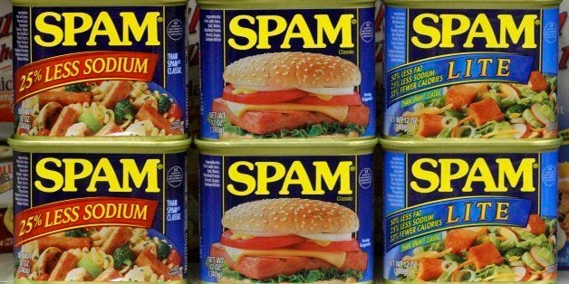 This photo taken Feb. 9. 2011, shows tins of Hormel Spam products on a shelf in a Bethel Park, Pa. Hormel Foods Corp.'s fiscal fourth-quarter net income fell 3 percent Tuesday, Nov. 22, 2011,as sales at its grocery products segment declined. (AP Photo/Gene J. Puskar)