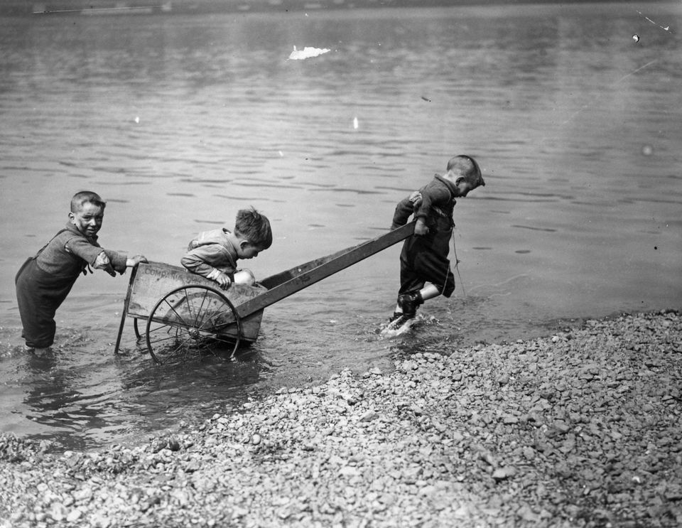June 6, 1925: Little boys playing with a