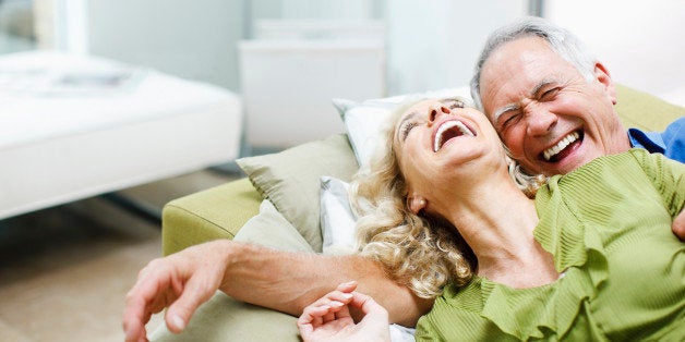 Couple laying on sofa together