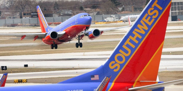 CHICAGO - APRIL 3: A Southwest Airlines jet takes off at Midway Airport April 3, 2008 in Chicago, Illinois. Officials from Southwest and other airlines will testify at a safety hearing on Capitol Hill today following recent cancellations of flights by Southwest, United, American and Delta airlines as jets were taken out of service for safety inspections. (Photo by Scott Olson/Getty Images)