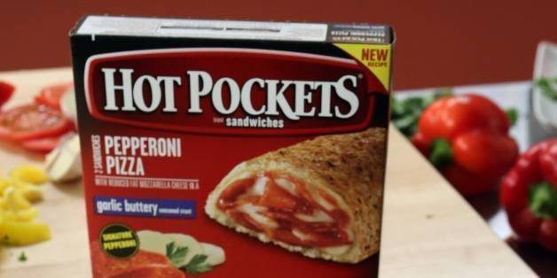 In this photo released by Nestlᅢテᅡᄅ Prepared Foods/Hot Pockets on July 16, 2013 - Food Network's "Sandwich King" Jeff Mauro and chef Lucien Vendᅢテᅡᄡme, Director of Nestlᅢテᅡᄅ Culinary Innovations, reveal the new Hot Pockets brand sandwiches at the Nestlᅢテᅡᄅ kitchen in Chatsworth, Calif. (Photo by Casey Rodgers/Invision for Nestlᅢテᅡᄅ Prepared Foods/Hot Pockets/AP Images)