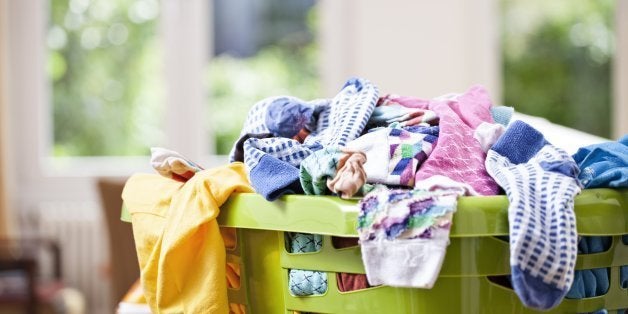 Germany, North Rhine Westphalia, Cologne, Clothes in laundry basket