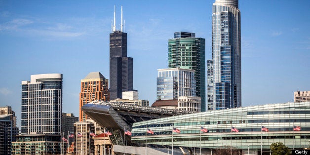 Photo of Chicago skyline with Soldier Field and Sears Tower (Willis Tower). Soldier Field is a football stadium and home to the Chicago Bears NFL football team. Sears Tower is one of the tallest buildings in the world. Picture was taken in late 2011 and is high resolution.