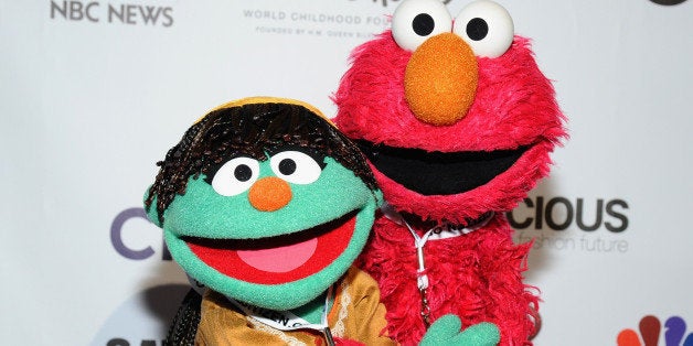 NEW YORK, NY - SEPTEMBER 27: Sesame Street muppets Raya (L) and Elmo attend VIP Lounge at the 2014 Global Citizen Festival to end extreme poverty by 2030 in Central Park on September 27, 2014 in New York City. (Photo by Ilya S. Savenok/Getty Images for Global Citizen Festival)