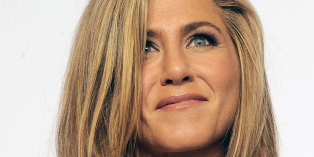 HOLLYWOOD, CA - FEBRUARY 22: Actress Jennifer Aniston poses inside the press room of the 87th Annual Academy Awards held at Loews Hollywood Hotel on February 22, 2015 in Hollywood, California. (Photo by Albert L. Ortega/Getty Images)