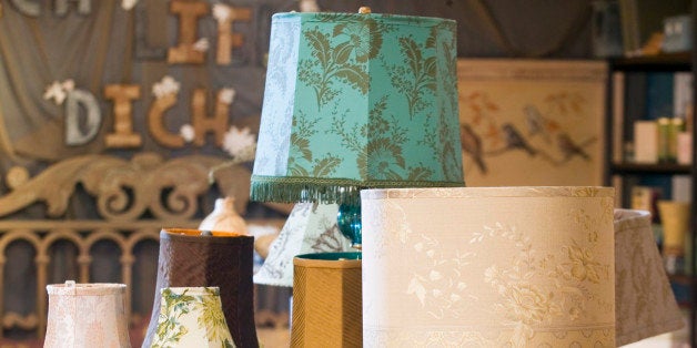 Choose a table lamp that provides the right light and reflects your personal style, like these mix-and-match lamp bases and shades at the Anthropologie store. (Photo by John Mutrux/Kansas City Star/MCT via Getty Images)