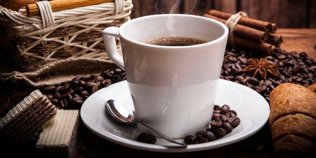 Coffee still life with cup of coffee with wood background