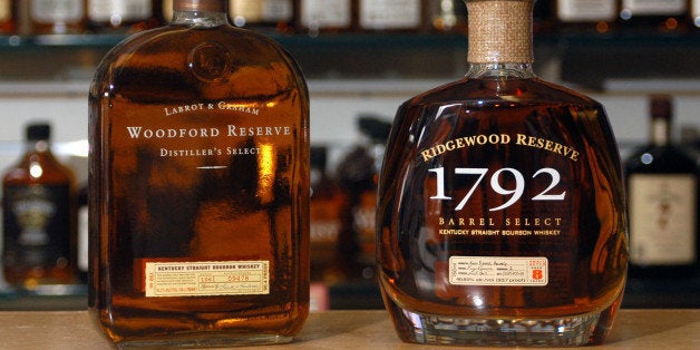 Bottles of Woodford Reserve premium bourbon, left, and Barton's Ridgewood Reserve, right, are shown Thursday, Feb. 12, 2004, in Louisville, Ky. Louisville-based Brown-Forman, the makers of Woodford Reserve, are accusing Barton's Ridgewood Reserve, right, of confusing buyers by distributing a copycat brand. Brown-Foreman has sued Barton in federal court, saying Barton has violated the federal Lanham Act, which prohibits unfair competition. (AP Photo/Brian Bohannon)