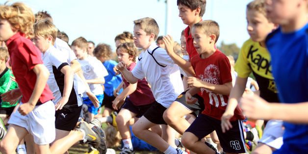Seven-year-old children taking part in sport as half of all seven-year-olds do not get enough exercise - and girls are far less active than boys, research shows.
