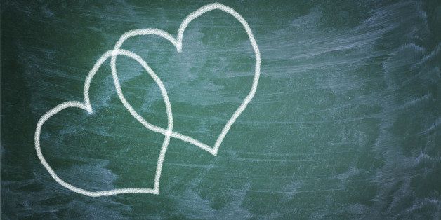 Love hearts drawing on a school chalkboard