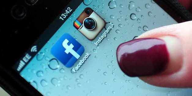 File photo dated 06/12/12 of Instagram and Facebook logos on a smartphone. Both social media sites appear to be unavailable for UK users.