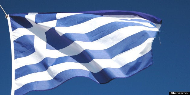 flag of greece waving in the...