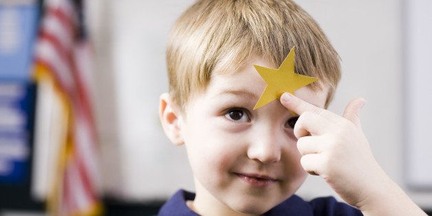 boy with gold star