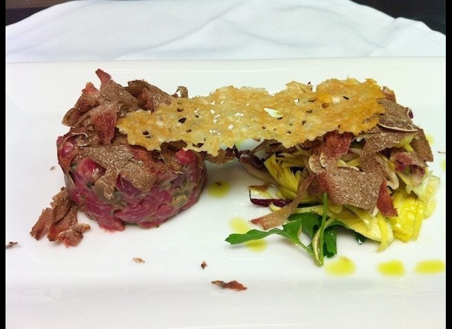 Tartar of filet mignon, artichoke salad and crispy Parmigiano Reggiano cheese