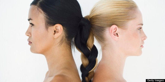 Two Young Women with Braided Ponytails