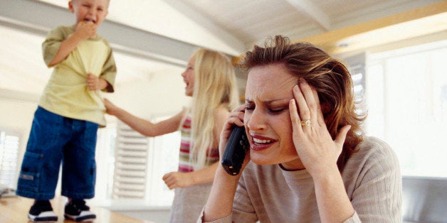 Stressed woman on telephone