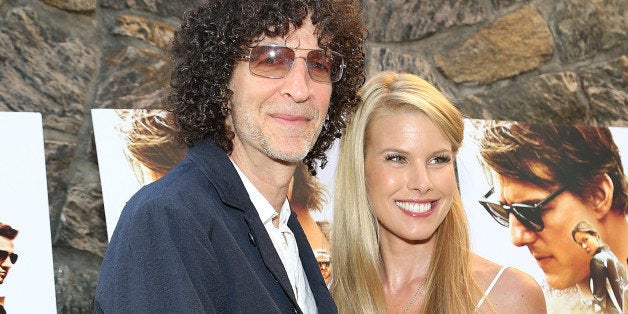 EAST HAMPTON, NY - JULY 24: Howard Stern (L) and Beth Ostrosky Stern attend the 'Mission: Impossible - Rogue Nation' Special Screening Hosted By Alec Baldwin, Arrivals at United Artists East Hampton Cinema on July 24, 2015 in East Hampton, New York. (Photo by Monica Schipper/Getty Images for Paramount Pictures Studios)