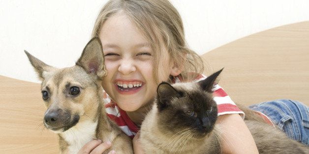 laughing girl with pets