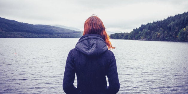 woman admiring stillness of the ...